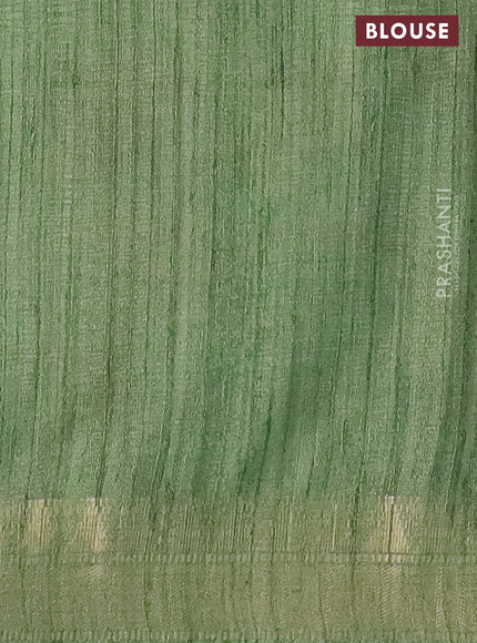 Semi tussar saree light green with allover floral prints and zari woven border