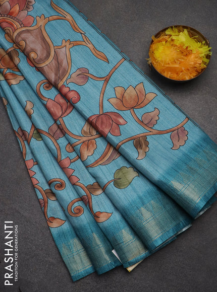 Semi tussar saree teal blue with allover floral prints and zari woven border