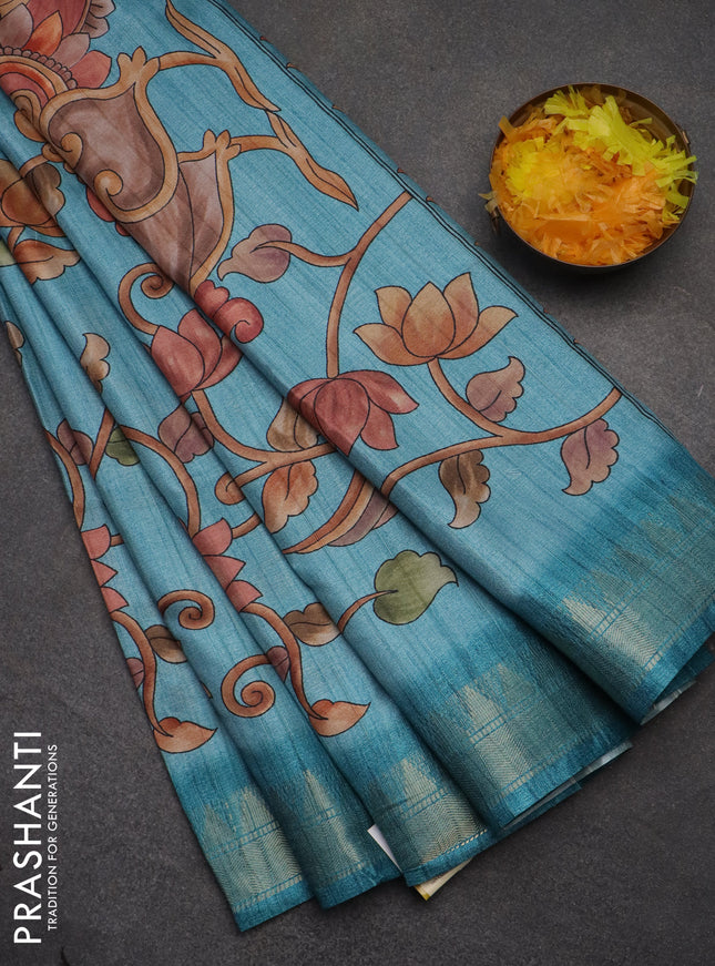 Semi tussar saree teal blue with allover floral prints and zari woven border