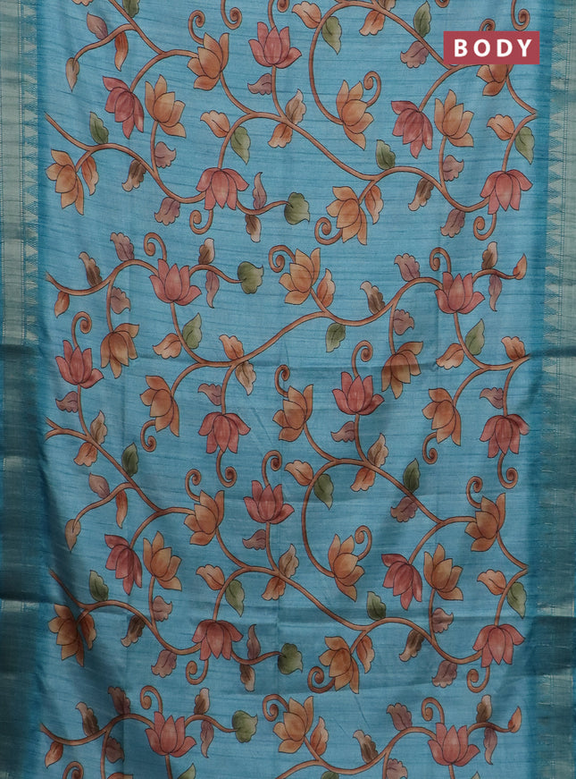 Semi tussar saree teal blue with allover floral prints and zari woven border