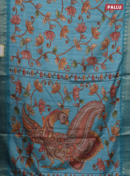 Semi tussar saree teal blue with allover floral prints and zari woven border
