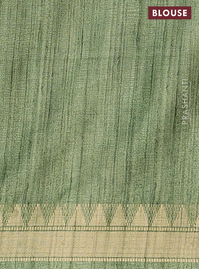 Semi tussar saree pastel green with allover floral prints and zari woven border