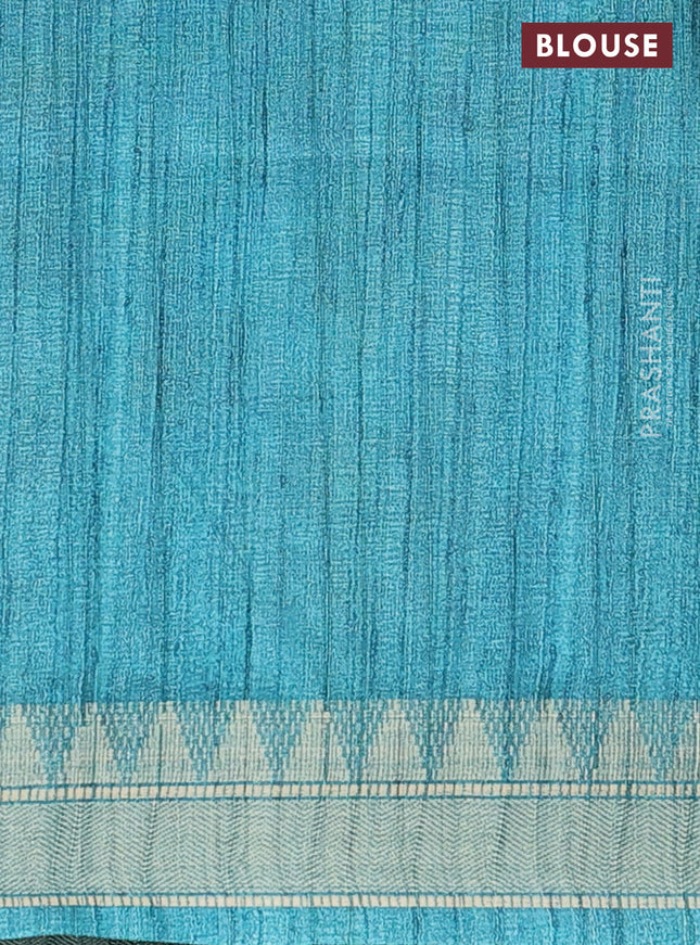 Semi tussar saree pastel blue with allover floral prints and zari woven border