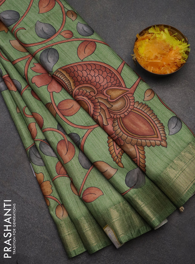 Semi tussar saree light green with allover floral prints and zari woven border
