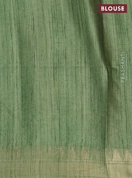 Semi tussar saree light green with allover floral prints and zari woven border