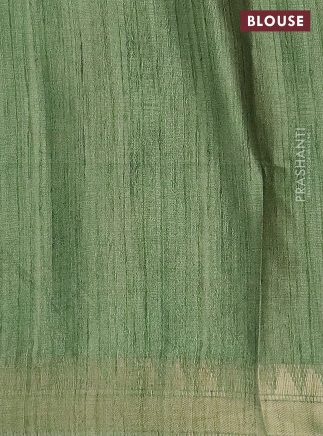 Semi tussar saree light green with allover floral prints and zari woven border