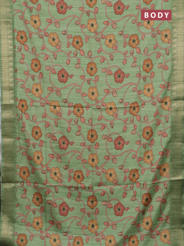 Semi tussar saree light green with allover floral prints and zari woven border