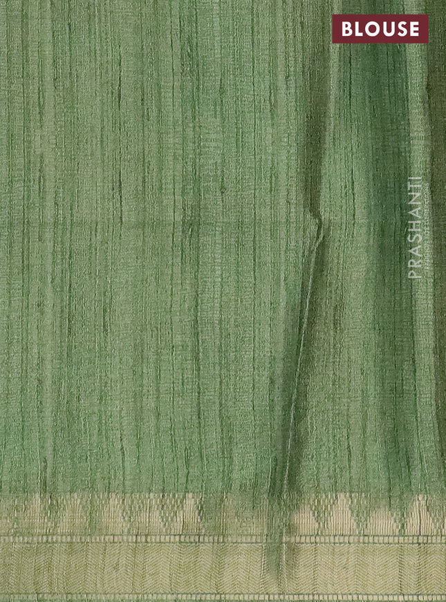 Semi tussar saree light green with allover floral prints and zari woven border