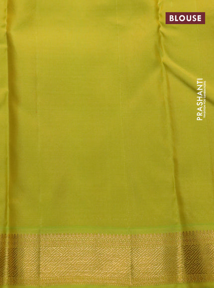 Pure kanchipuram silk saree green and lime green with woven zari buttas and temple design zari woven border