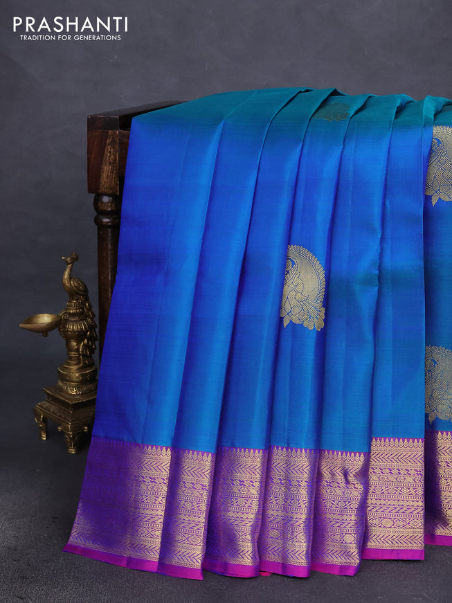 Pure kanchipuram silk saree dual shade of bluish green and dual shade of purple with woven zari buttas and zari woven border