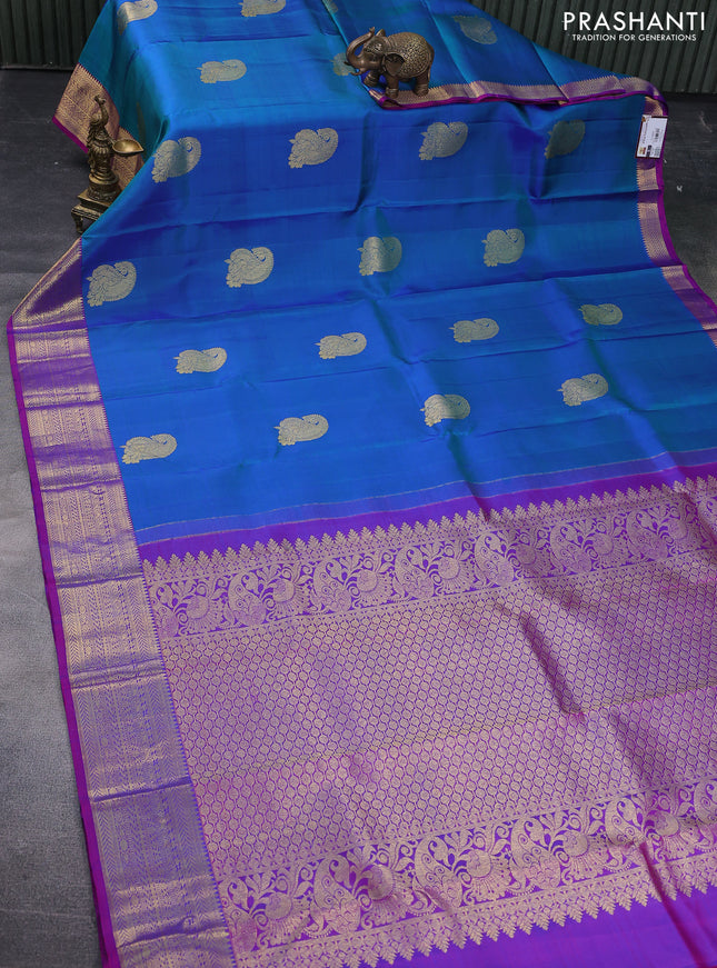 Pure kanchipuram silk saree dual shade of bluish green and dual shade of purple with woven zari buttas and zari woven border