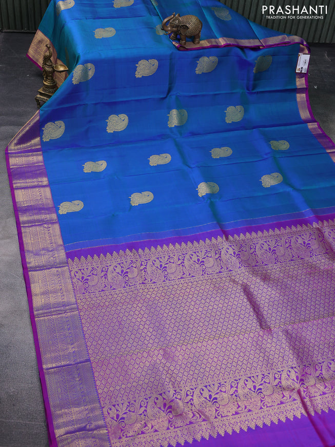 Pure kanchipuram silk saree dual shade of bluish green and dual shade of purple with woven zari buttas and zari woven border