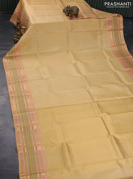 Pure kanchipuram silk saree cream with zari woven buttas and long zari woven border