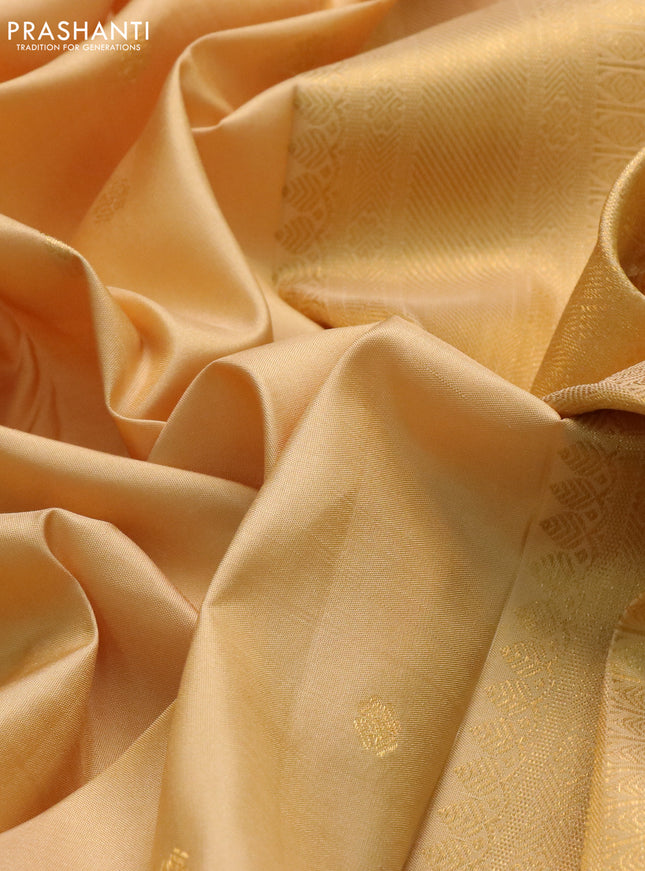 Pure kanchipuram silk saree cream with zari woven buttas and long zari woven border