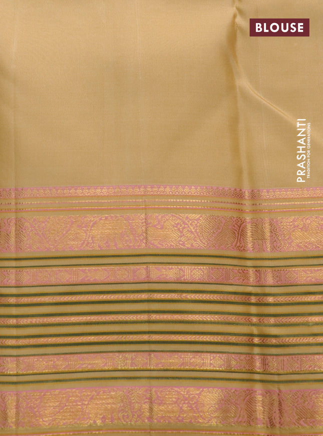 Pure kanchipuram silk saree cream with zari woven buttas and long zari woven border