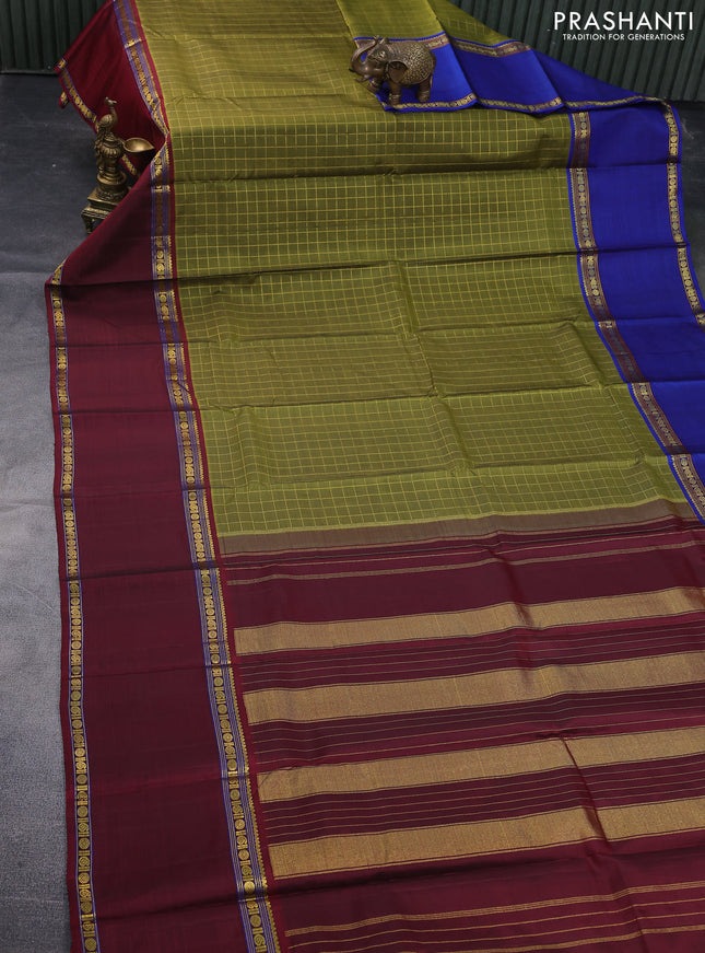 Pure kanchipuram silk saree mehendi green with allover zari checked pattern and ganga jamuna border