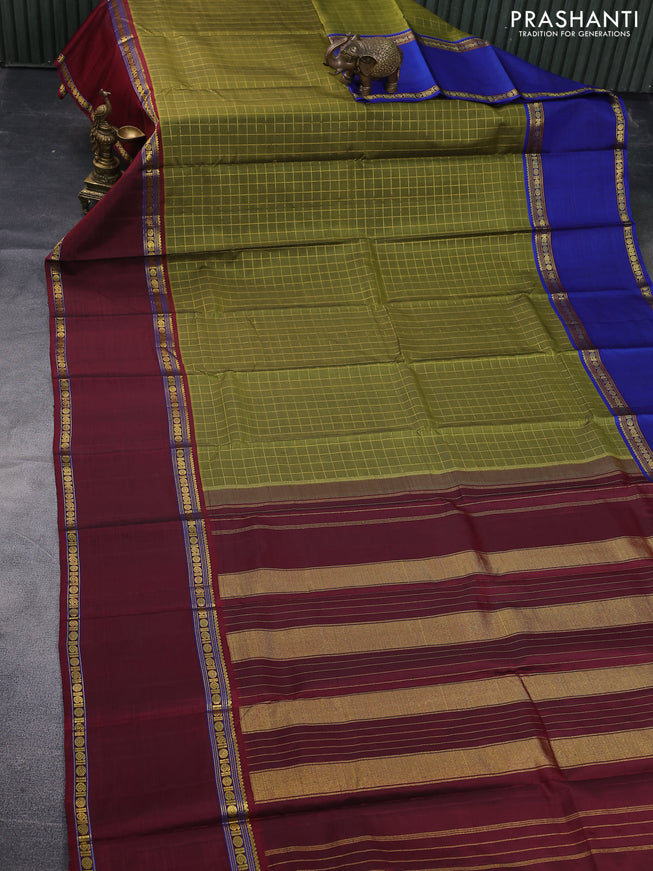 Pure kanchipuram silk saree mehendi green with allover zari checked pattern and ganga jamuna border