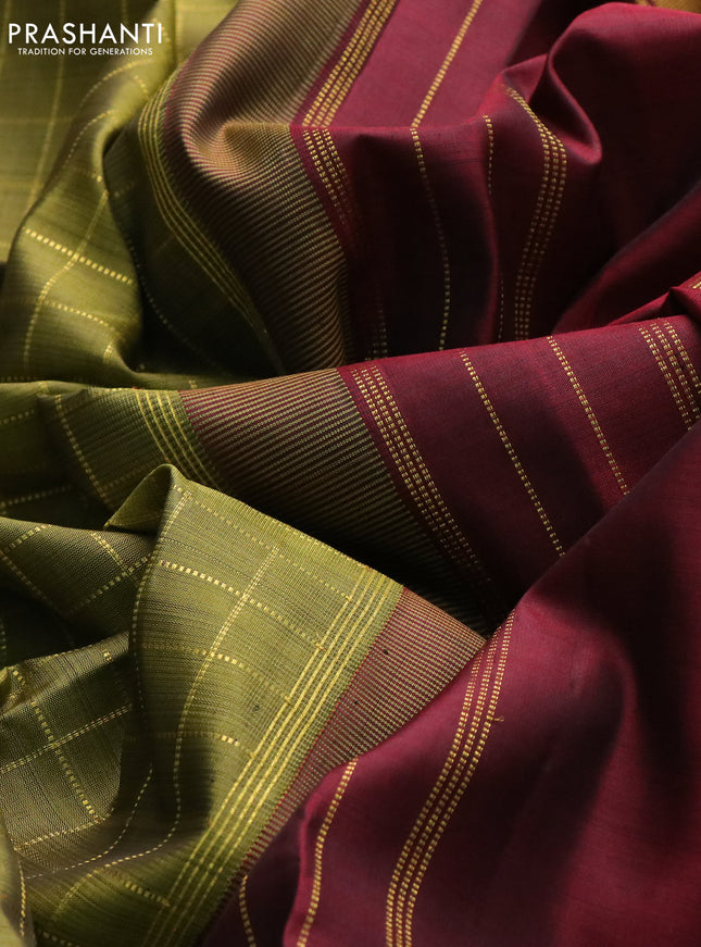 Pure kanchipuram silk saree mehendi green with allover zari checked pattern and ganga jamuna border