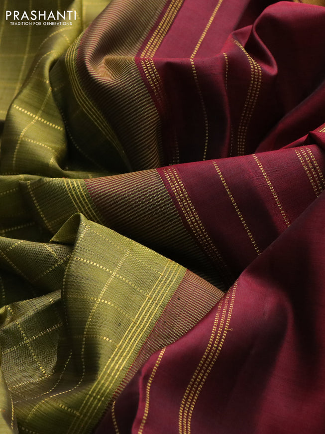 Pure kanchipuram silk saree mehendi green with allover zari checked pattern and ganga jamuna border