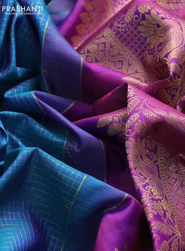 Pure kanchipuram silk saree dual shade of teal blue and dual shade of purple with allover zari checks & zari paisley buttas and zari woven border