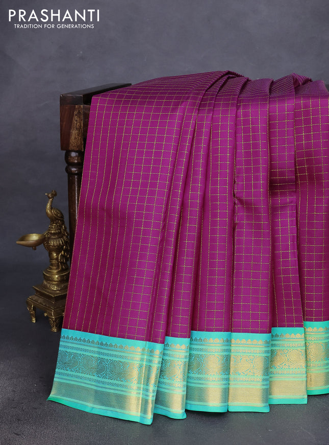 Pure kanchipuram silk saree magenta pink and teal green sahde with allover zari checked pattern and annam zari woven koravi border