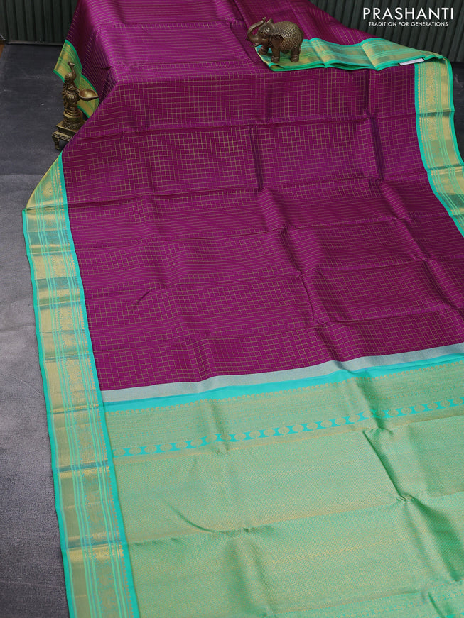 Pure kanchipuram silk saree magenta pink and teal green sahde with allover zari checked pattern and annam zari woven koravi border