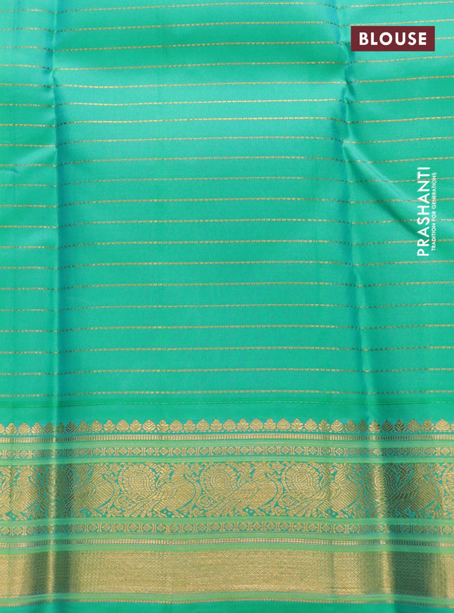 Pure kanchipuram silk saree magenta pink and teal green sahde with allover zari checked pattern and annam zari woven koravi border