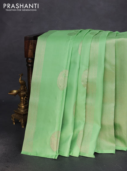 Pure kanchipuram silk saree pista green and wine shade with allover zari weaves & buttas in borderless style