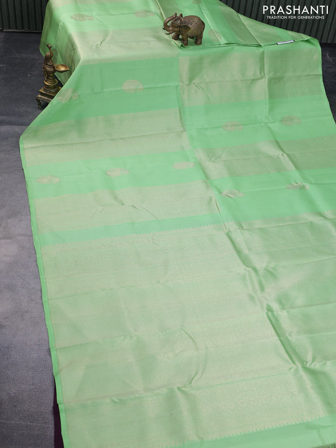 Pure kanchipuram silk saree pista green and wine shade with allover zari weaves & buttas in borderless style