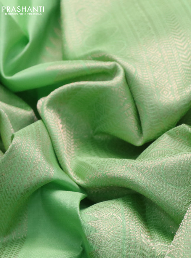 Pure kanchipuram silk saree pista green and wine shade with allover zari weaves & buttas in borderless style