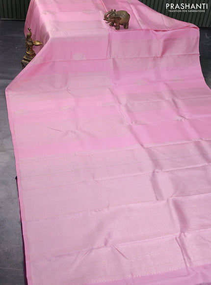 Pure kanchipuram silk saree peach pink and dark magenta pink with allover zari weaves & buttas in borderless style