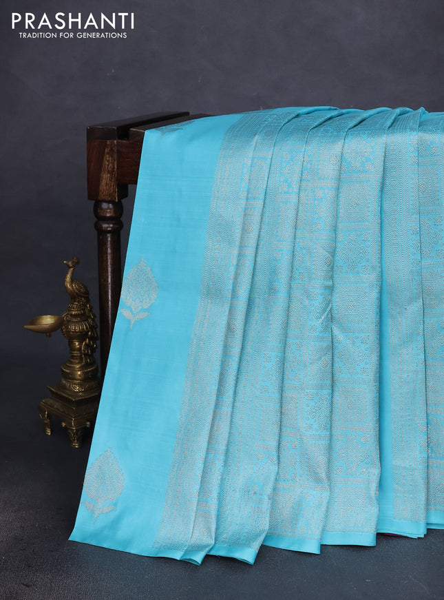 Pure kanchipuram silk saree teal blue shade and purple with allover zari weaves & buttas in borderless style