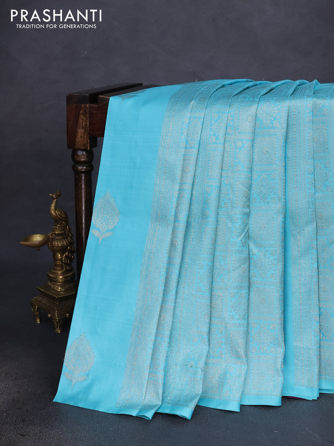 Pure kanchipuram silk saree teal blue shade and purple with allover zari weaves & buttas in borderless style