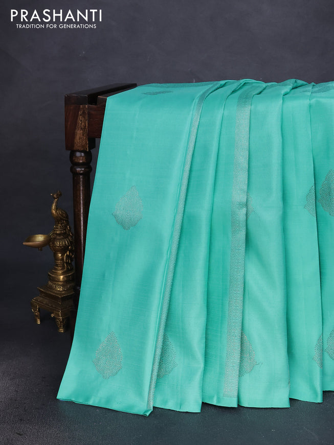 Pure kanchipuram silk saree teal shade and magenta pink with allover zari weaves & buttas in borderless style