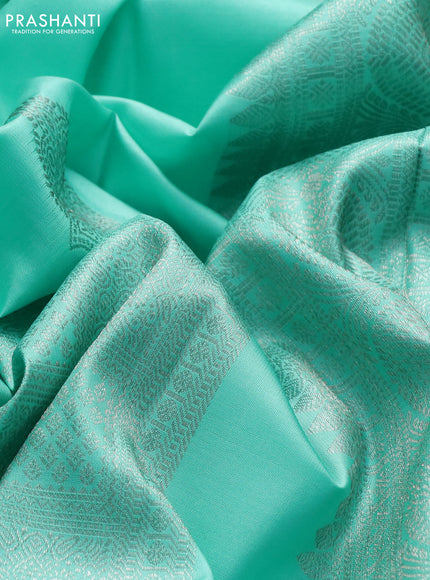 Pure kanchipuram silk saree teal shade and magenta pink with allover zari weaves & buttas in borderless style