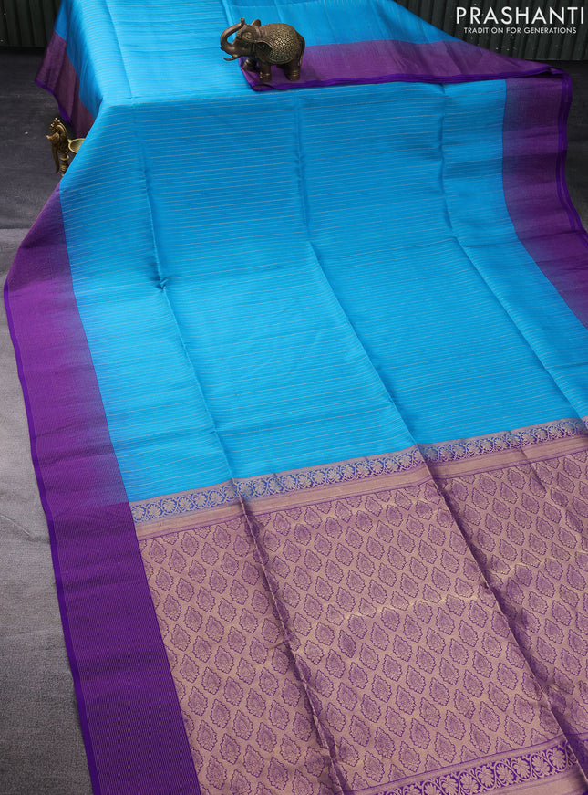 Pure soft silk saree teal blue and violet with allover zari weaves and zari woven border