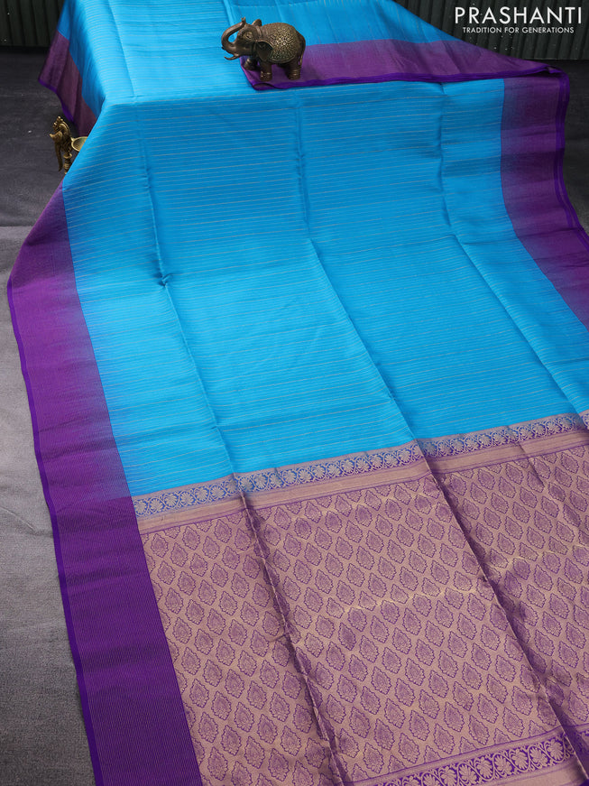 Pure soft silk saree teal blue and violet with allover zari weaves and zari woven border