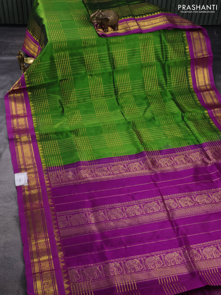 Silk cotton saree green and purple with zari checked pattern and zari woven korvai border