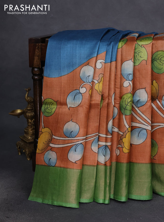 Pure tussar silk saree rust shade and green with allover kalamkari hand painted prints and zari woven border