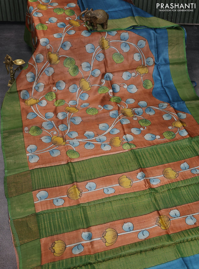 Pure tussar silk saree rust shade and green with allover kalamkari hand painted prints and zari woven border