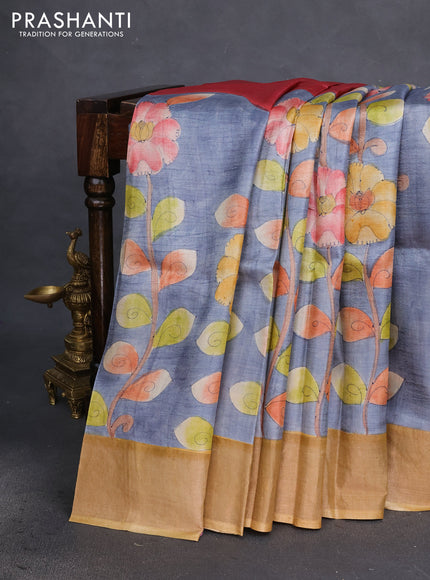 Pure tussar silk saree grey and mustard shade with allover floral hand painted prints and zari woven border