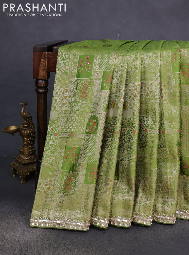 Banarasi silk saree light green with allover zari woven brocade weaves and embroidery sequin work border
