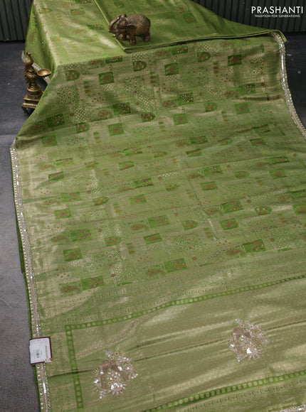 Banarasi silk saree light green with allover zari woven brocade weaves and embroidery sequin work border