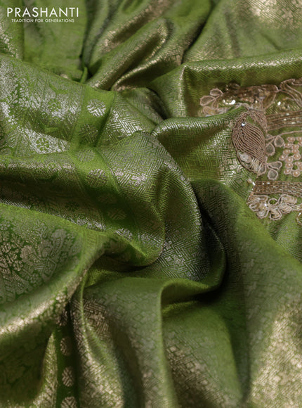 Banarasi silk saree light green with allover zari woven brocade weaves and embroidery sequin work border
