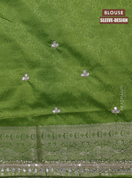 Banarasi silk saree light green with allover zari woven brocade weaves and embroidery sequin work border