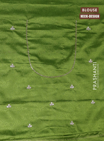 Banarasi silk saree light green with allover zari woven brocade weaves and embroidery sequin work border