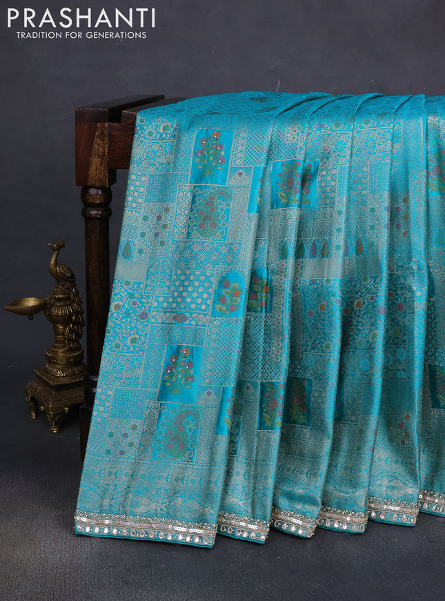 Banarasi silk saree teal blue with allover zari woven brocade weaves and embroidery sequin work border