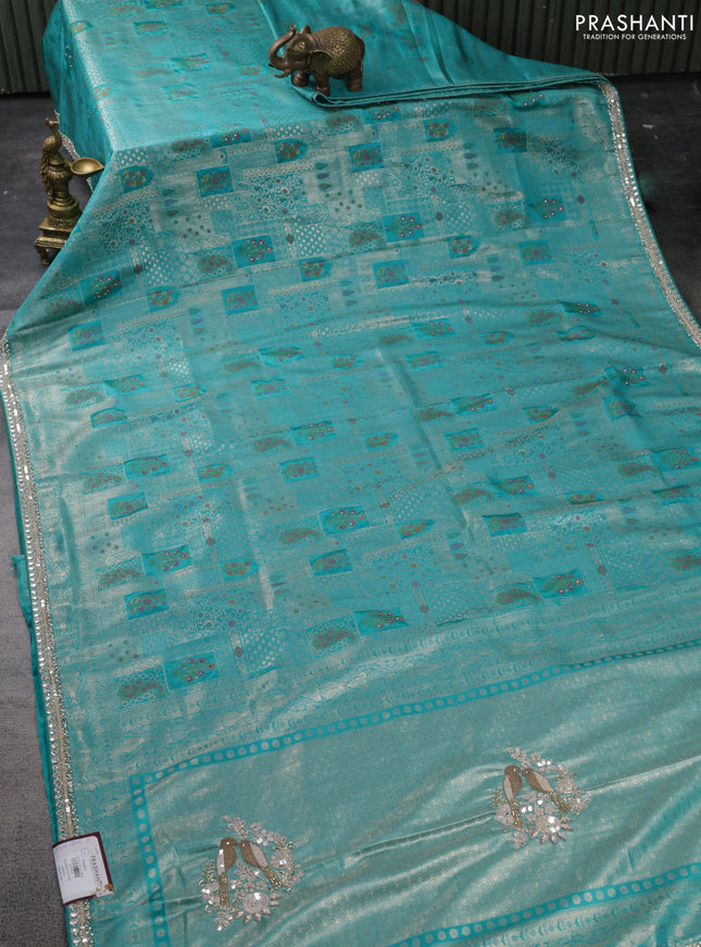 Banarasi silk saree teal blue with allover zari woven brocade weaves and embroidery sequin work border