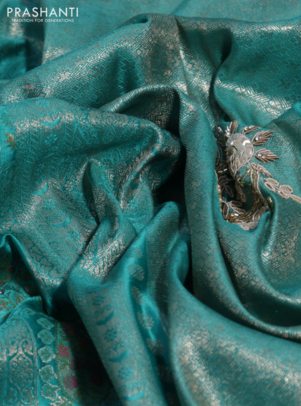 Banarasi silk saree teal blue with allover zari woven brocade weaves and embroidery sequin work border