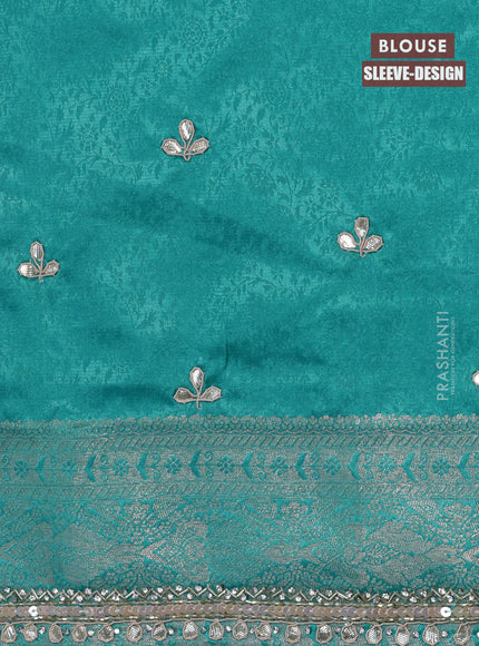 Banarasi silk saree teal blue with allover zari woven brocade weaves and embroidery sequin work border
